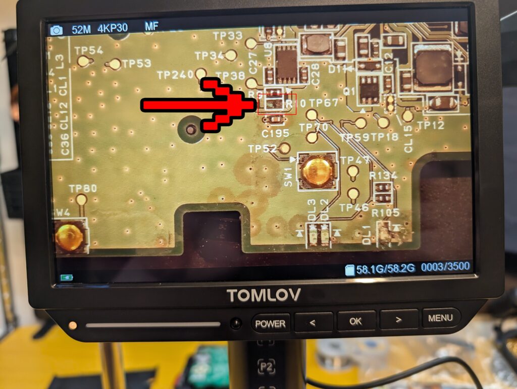 水没した3DSLLの起動ボタン付近の写真